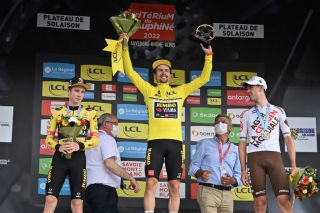 Jonas Vingegaard, Primoz Roglic and Ben O'Connor on the podium at the Criterium du Dauphine in 2022